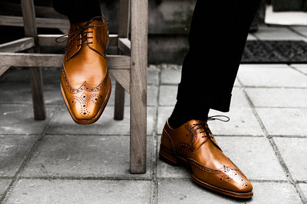 Shoes. Pair of formal man shoes. Expensive custom made shoes. Wedding detail.